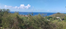 Baillif. Terrain 1095 m2 avec vue mer exceptionnelle