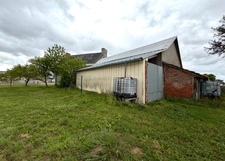 Maison en pierre de 111 m² avec garage, dépendance et terrain de 1 374 m² – Fort potentiel MOON SUR ELLE (50)