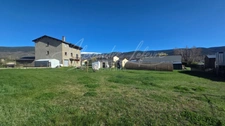 Propriété aux volumes exceptionnels avec jardin et vue montagne