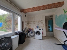 Maison 9 pièces, 4 chambres, avec fort potentiel d'évolution à Perrusson - terrain de 459 m²
