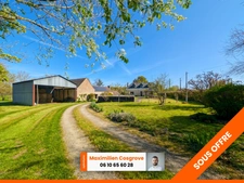 Propriété avec hangar et 4 800 m² de terrain