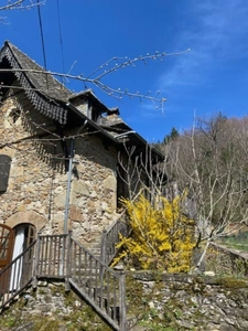 Authentic Auvergne mill on the banks of a stream.