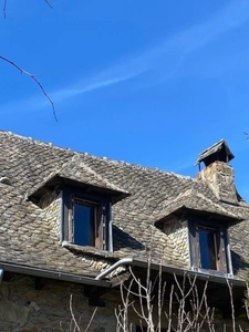 Authentic Auvergne mill on the banks of a stream.