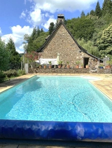 Authentic Auvergne mill on the banks of a stream.