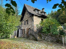 Authentic Auvergne mill on the banks of a stream.