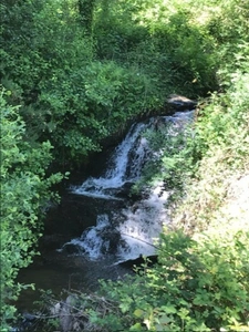 Authentic Auvergne mill on the banks of a stream.