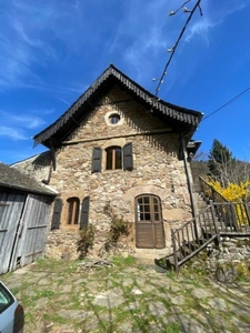 Authentic Auvergne mill on the banks of a stream.
