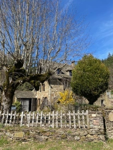 Authentic Auvergne mill on the banks of a stream.