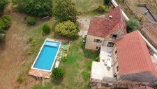 A fully renovated character property with swimming pool, unobstructed views and an exceptional setting in the heart of the Périgord Noir