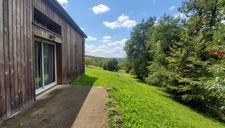 Maison lumineuse de 180m², grande mezzanine, vue dégagée et nature préservée – Orliac