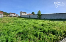 Terrain constructible dans un village convivial 