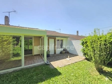 Charmante maison de plain-pied de 71 m² avec véranda, garage, jardin et panneaux photovoltaïques