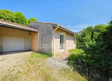 Charmante maison de plain-pied de 71 m² avec véranda, garage, jardin et panneaux photovoltaïques