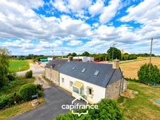 Maison à vendre proche Pontivy – 85 m² – 2 chambres – terrain 807 m² – garage – fort potentiel