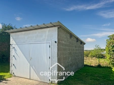 Maison à vendre proche Pontivy – 85 m² – 2 chambres – terrain 807 m² – garage – fort potentiel
