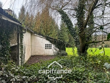 Stone house with outbuildings and large grounds – Wooded and quiet setting – La Motte (22600)