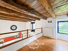 Renovated stone house – 300 m² of living space – 10 rooms – 2,800 m² plot – Réguiny – Garage – Single-storey living