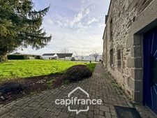 Renovated stone house – 300 m² of living space – 10 rooms – 2,800 m² plot – Réguiny – Garage – Single-storey living