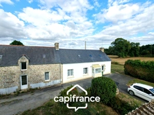Maison à vendre proche Pontivy – 85 m² – 2 chambres – terrain 807 m² – garage – fort potentiel