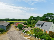 PROPERTY COMPRISING A HOUSE, A 360 M² SHED, NUMEROUS OUTBUILDINGS AND 6,280 M² OF LAND – SET IN NATURAL SURROUNDINGS IN KERFOURN, NEAR PONTIVY