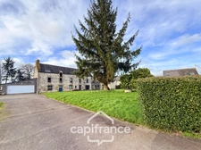 Renovated stone house – 300 m² of living space – 10 rooms – 2,800 m² plot – Réguiny – Garage – Single-storey living