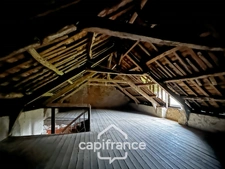 Stone house with outbuildings and large grounds – Wooded and quiet setting – La Motte (22600)