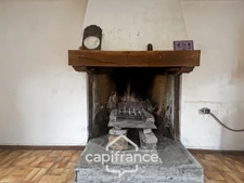 Stone house with outbuildings and large grounds – Wooded and quiet setting – La Motte (22600)