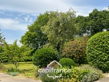 PROPERTY COMPRISING A HOUSE, A 360 M² SHED, NUMEROUS OUTBUILDINGS AND 6,280 M² OF LAND – SET IN NATURAL SURROUNDINGS IN KERFOURN, NEAR PONTIVY