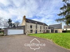 Renovated stone house – 300 m² of living space – 10 rooms – 2,800 m² plot – Réguiny – Garage – Single-storey living