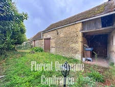 JORT – Maison de bourg en pierre avec dépendances et jardin