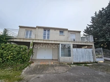 34230 LE POUGET – MAISON INDIVIDUELLE – 10 PIECES – LUMINEUSE – TERRASSES, VERANDAS et JARDIN – GARAGE – REVENUS LOCATIFS