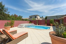 LUNEL (34400) – MAISON INDIVIDUELLE – 4 CHAMBRES – PISCINE CHAUFFÉE – TERRASSE – 2 LOGEMENTS – GARAGE