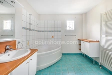Maison familiale atypique de 170 m² avec jardin, terrasse et garage double – Collonges-au-Mont-d'Or