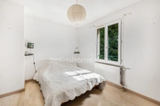 Maison familiale atypique de 170 m² avec jardin, terrasse et garage double – Collonges-au-Mont-d'Or