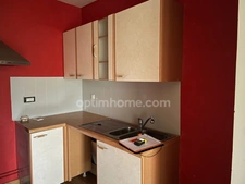 Ensemble immobilier composé d'une maison d'habitation, d'un appartement, d'un corps de ferme sur un terrain constructible.