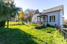 Maison avec terrain à Nébouzat, 88 m² habitable, véranda et garage.
