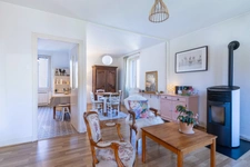 Maison avec terrain à Nébouzat, 88 m² habitable, véranda et garage.