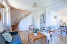 Maison avec terrain à Nébouzat, 88 m² habitable, véranda et garage.
