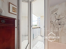 Appartement 2 pièces lumineux avec loggia, balcon, cave et parking proche gare