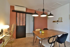 Renovated 100 m² house with a double garage, garden, and terraces