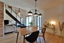 Renovated 100 m² house with a double garage, garden, and terraces