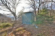 Maison dans un environnement boisé