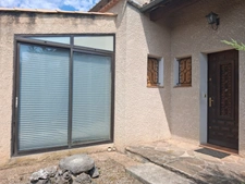 L'ESCALE – Maison individuelle avec véranda, garage et jardin arboré