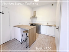 Exclusivité : Agen hyper centre, bel immeuble de caractère en pierre entièrement rénové avec 4 appartements, garage et jardin