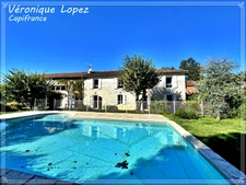 Feugarolles, belle longère en pierre rénovée de 289m² habitables avec jardin, piscine, atelier, séchoir à tabac