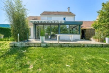 Christophe Michaudelle – CAPIFRANCE - vous propose à JUILLY : maison - 7 pièces - 175 m² - 5 chambres - grandes pièces de vie avec véranda - 2 pièces d'eau - dressing - buanderie - garage et stationne