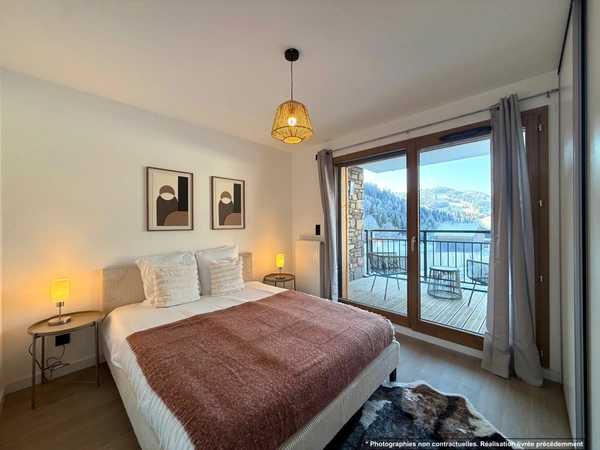 À vendre – Magnifique appartement T4 en duplex de 110,76 m² habitables (127 m² au sol), situé au dernier étage, au cœur du village de Châtel (74)