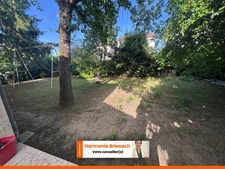 Maison familiale avec grand jardin, terrasse couverte et garage