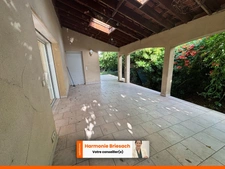 Maison familiale avec grand jardin, terrasse couverte et garage