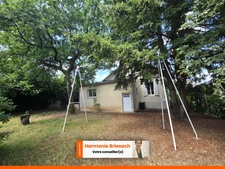 Maison familiale avec grand jardin, terrasse couverte et garage